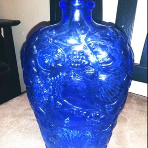 Blue bottle with flower print